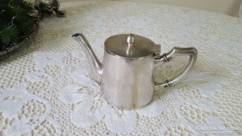 Old, silver-plated hotel coffee and tea pot, jug