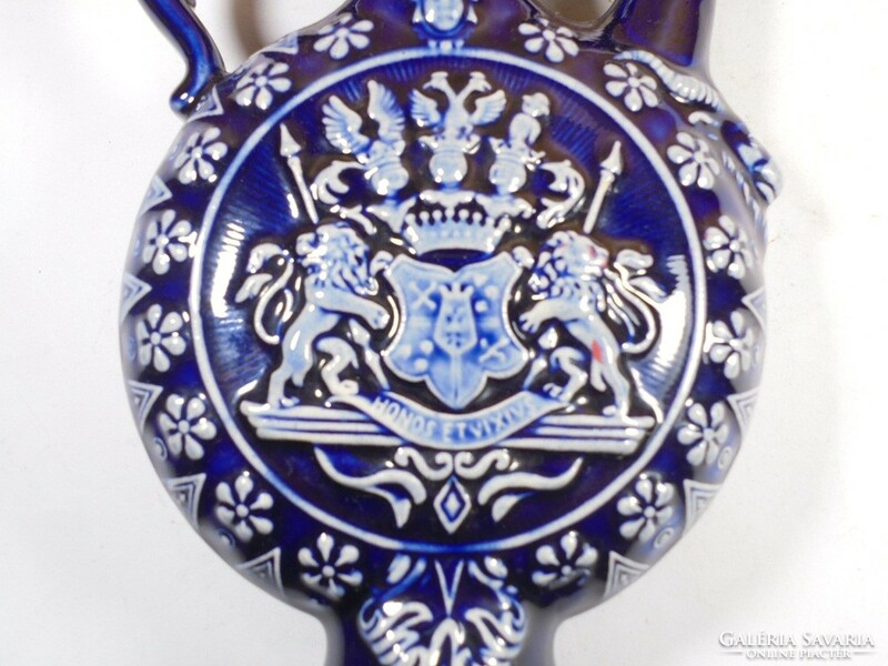 Retro old - honosetvi xvs - blue glazed painted ceramic jug with jug stopper - embossed coat of arms pattern