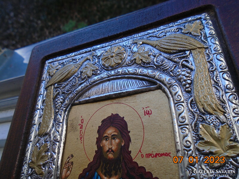 950 A gilded Byzantine icon of Saint John the Baptist in a silver ornate frame, museum copy with certificate