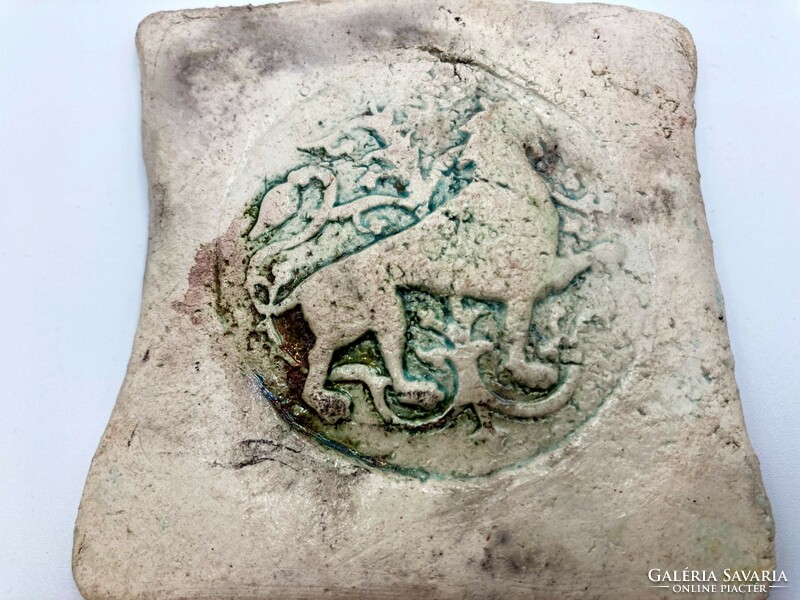 Raku ceramic image of a lion