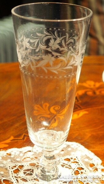 Champagne glass with a beautiful polished floral pattern