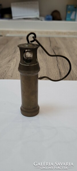 Old copper mini mining lamp, carbide lamp.