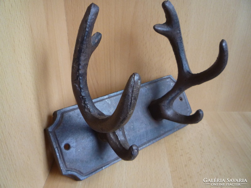 Cast iron hunting hook.
