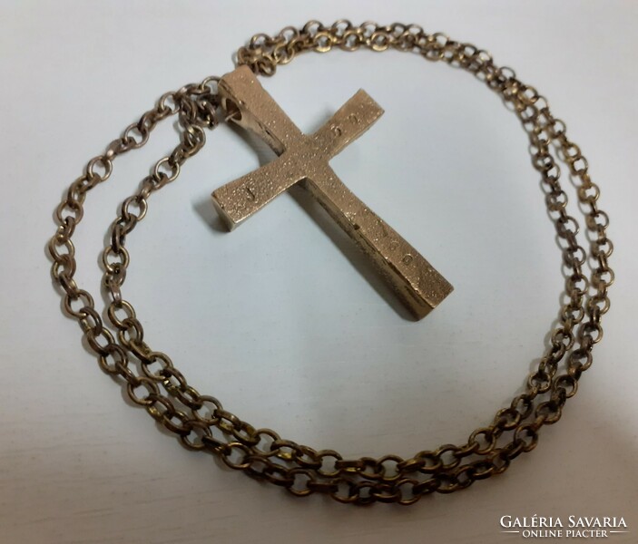 Old applied art bronze cross pendant on a chain