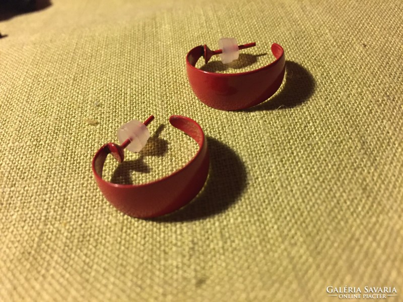 Pair of studded red metal earrings (£8)