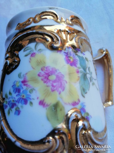 Antique, richly gilded, Victorian porcelain cup
