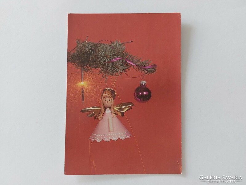 Old Christmas card retro postcard with Christmas tree decorations angel