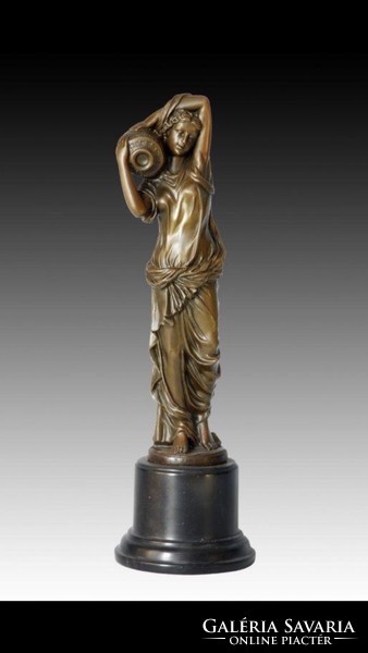 Bronze statue of a pitcher woman