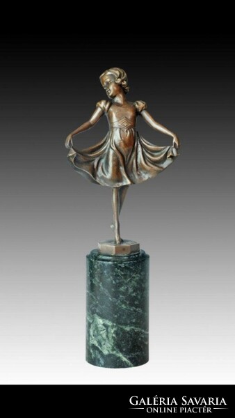 Bronze statue of a little girl dancing