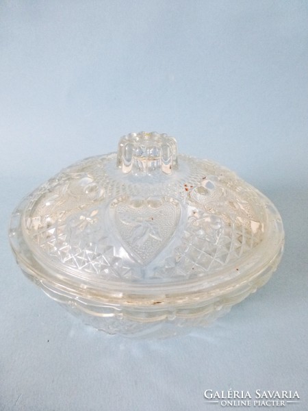 Old glass sugar bowl with heart pattern