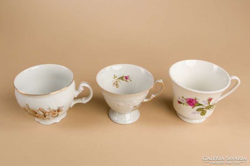 Porcelain tea cups, coasters, 3 each, different.