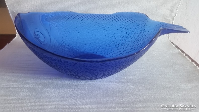 A beautiful fish-shaped deep serving bowl made of blue glass