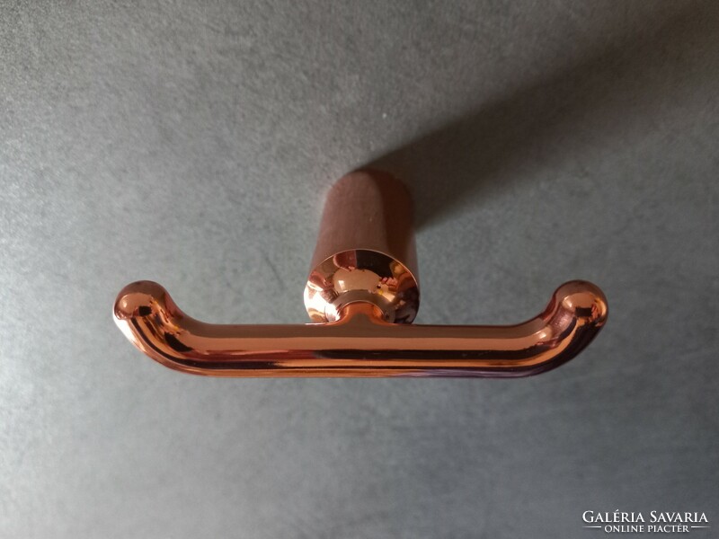 Rose gold-colored two-pronged metal hanger, hanger