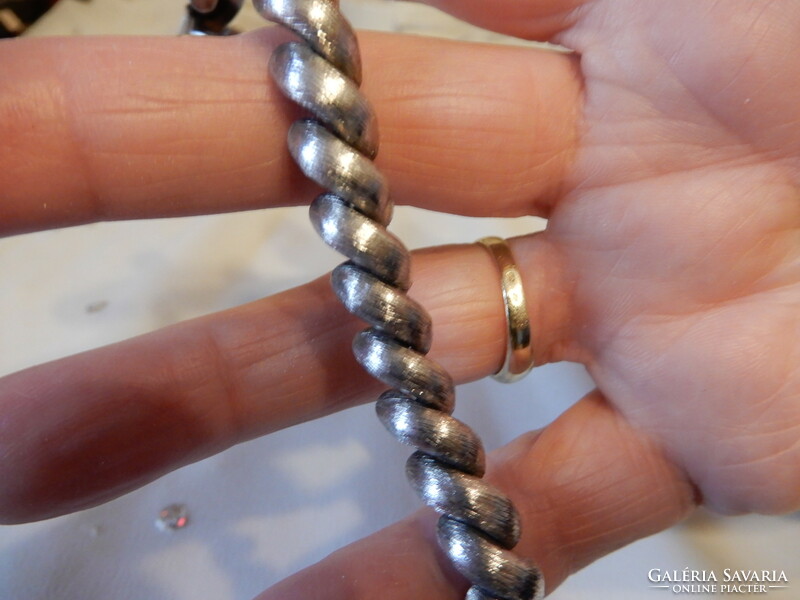 Antique silver bracelet with braided pattern