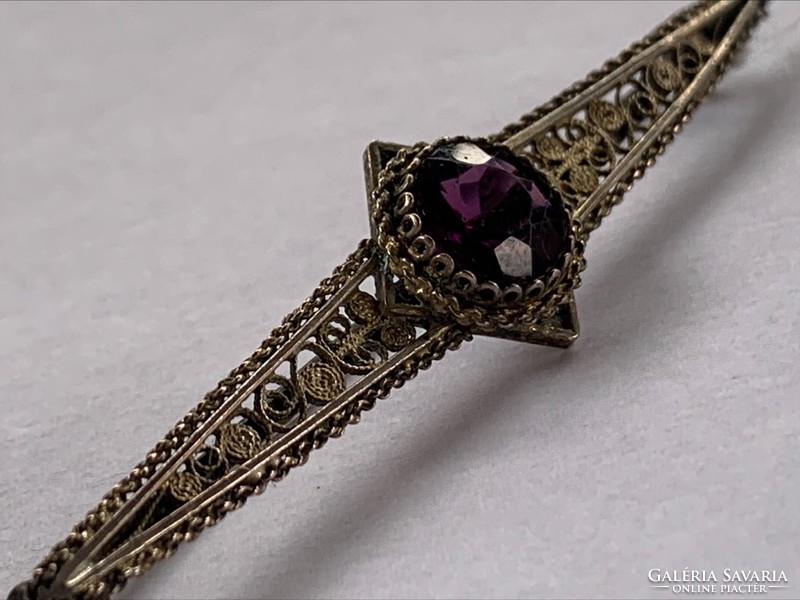 Antique silver-plated copper brooch with purple stone