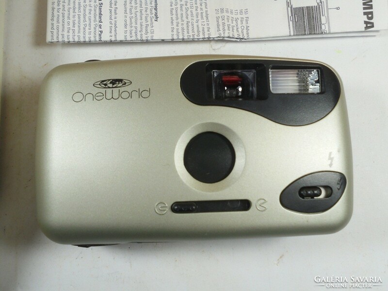 Retro old camera in camera case - oneworld from the 1990s