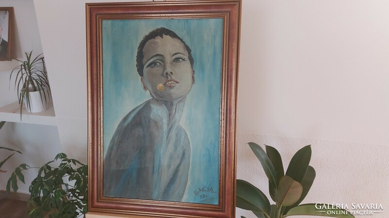 (K) young lady painting with a 50x70 cm frame