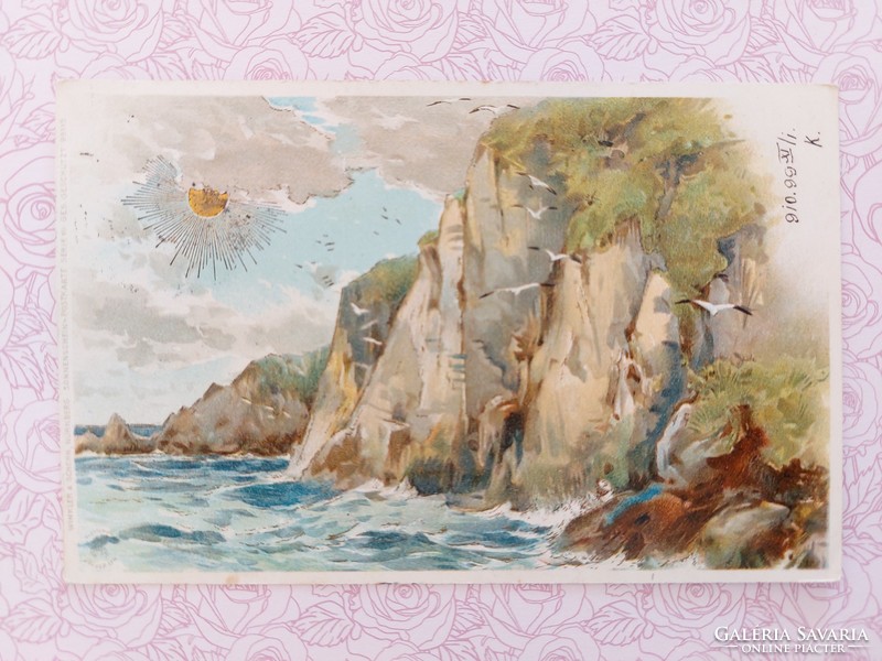 Régi képeslap 1899 levelezőlap sziklás tengerpart arany Nap motívum