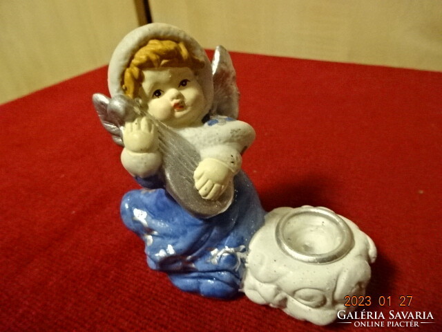 Porcelain figure, musical angel, also a candle holder. He has! Jokai.
