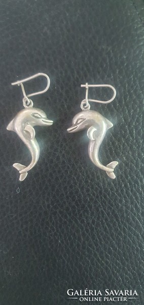 Silver dolphin shaped craftsman earrings