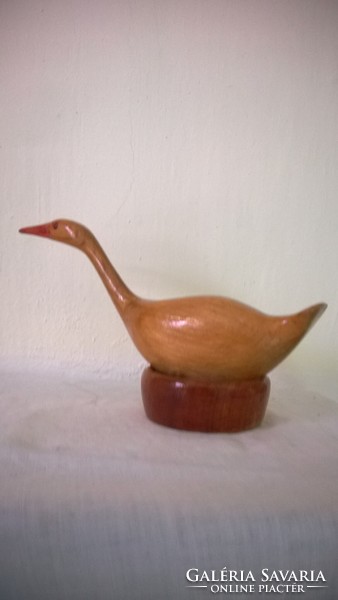 Poet wild goose v. Other bird, wooden, on rotating nest 20x11 cm