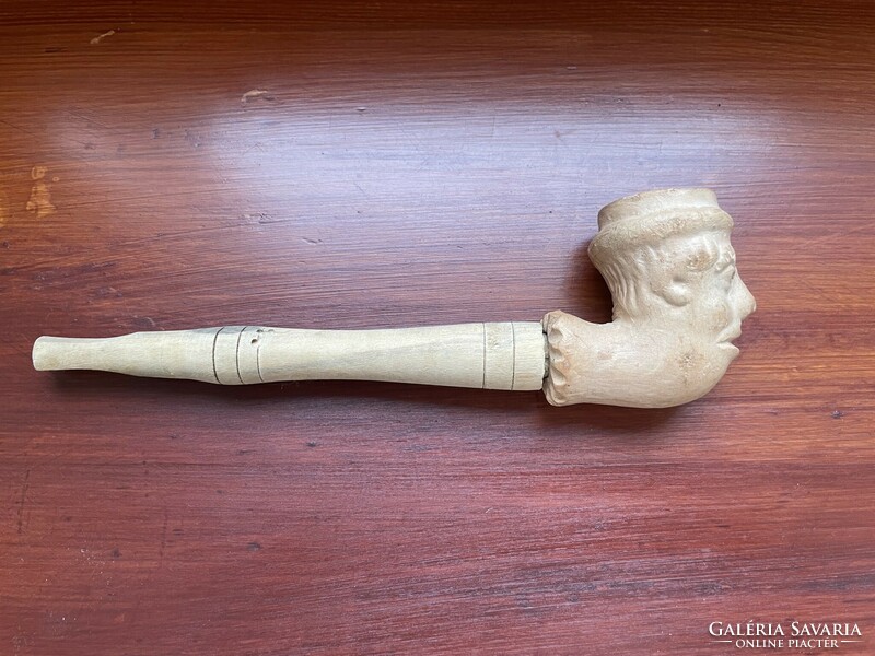 Human-headed pipe with stem