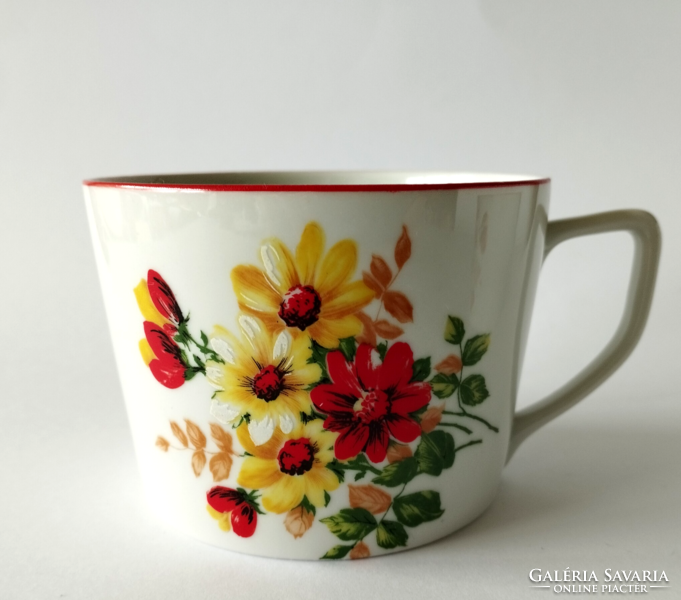 1 old large porcelain cocoa mug with a bouquet of beautiful spring flowers