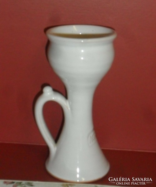 Ceramic eared candle holder with Agrikon inscription. 13.5 cm high.