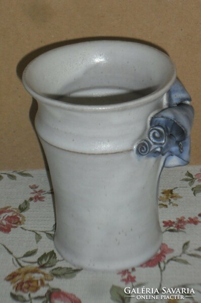 Unique blue decorative small ceramic vase.