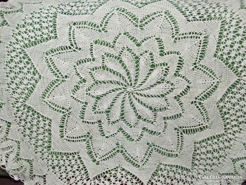 Beautiful needlework: large knitted lace tablecloth 113 cm