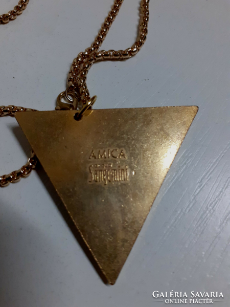 Marked applied arts gilt relief bronze triangle pendant on a gilt thick long chain