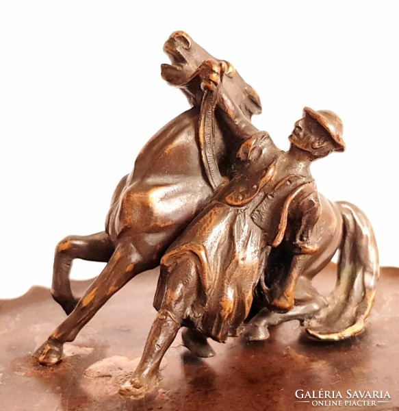 Mini bronze statue of a colt braking his horse