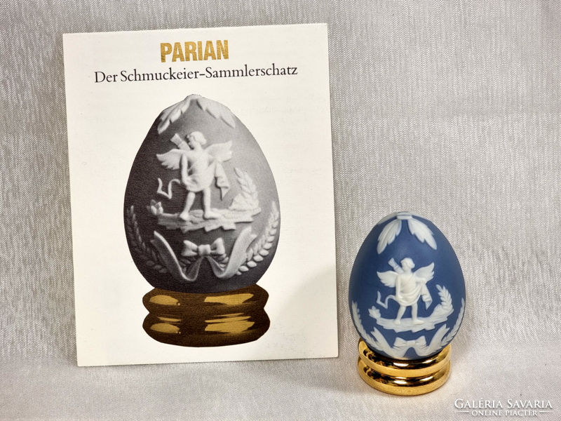 Franklin as a Parian egg with a white pattern on a blue background. On a gold-colored holder. Flawless collector's item