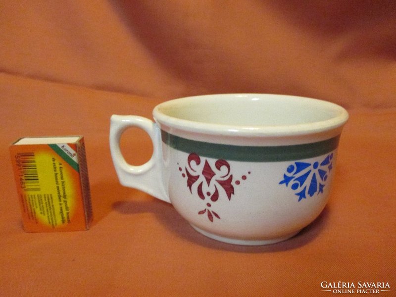 Old floral cup with mug