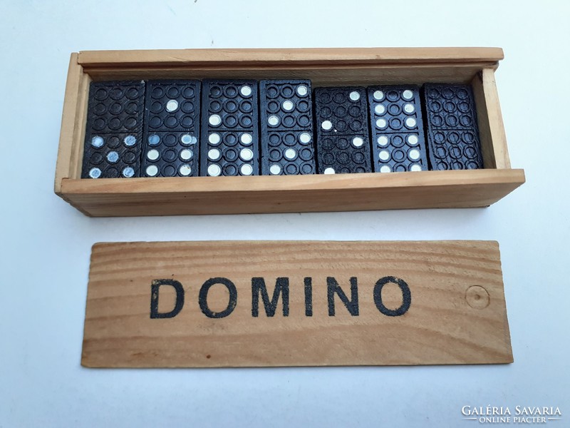 Retro toy old domino in wooden box