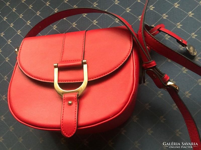 Brand new women's bag. With a very well-organized interior. I received it as a gift, but I have never used it.
