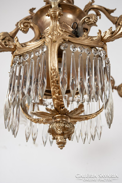 Gilded bronze chandelier with angel figure and crystal pendants