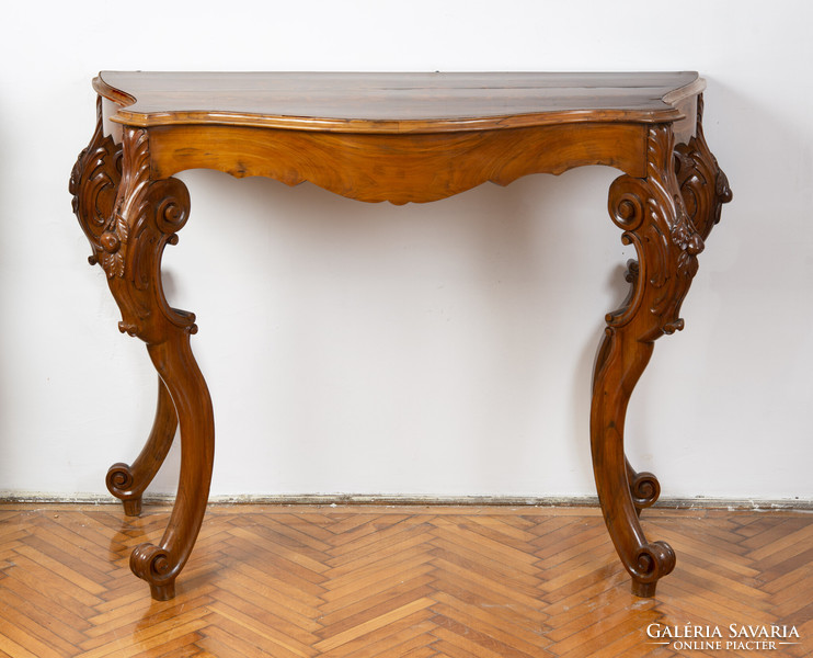 Carved wooden console table with inlaid decoration on top