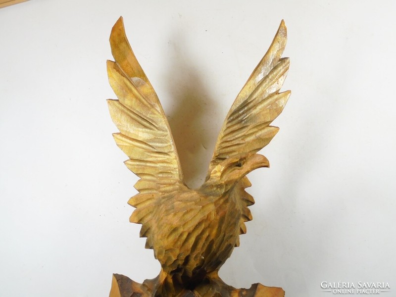 Wood carved eagle statue