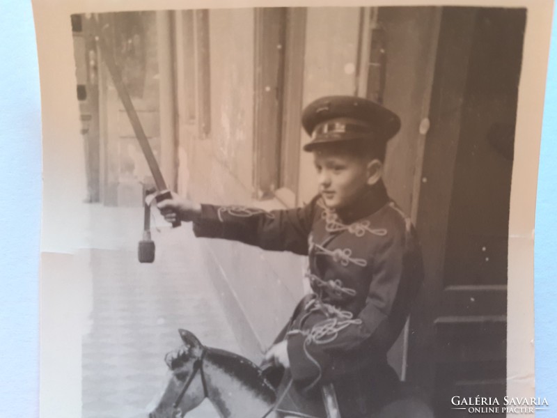 Old child's photo vintage photo of little boy riding hussar