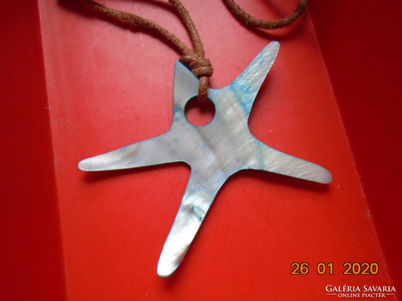 Spectacular mother-of-pearl starfish pendant on a leather cord