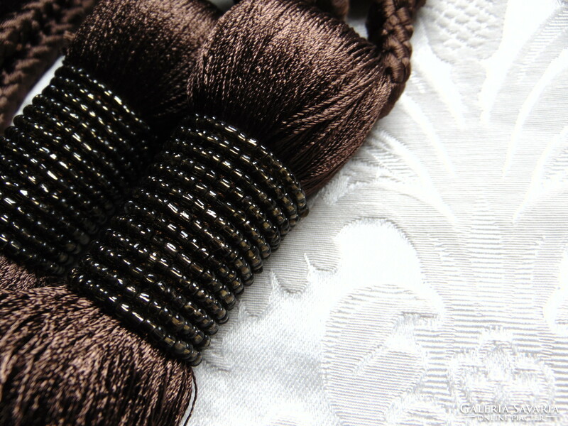 Beautiful beaded brown silk curtain ties in a pair