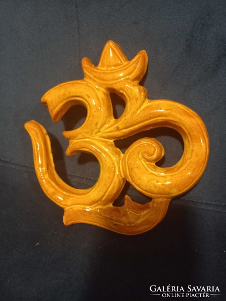 Ohm sign Buddhist Vedelmi symbol in glazed ceramic