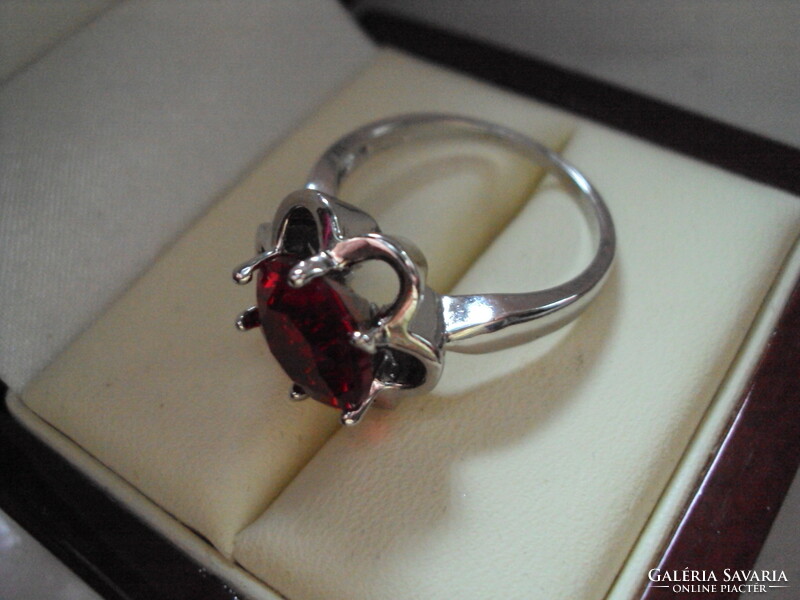 Silver ring with a huge burgundy stone