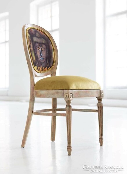 Individual patterned, colorful chairs decorated with Buddha images are for sale