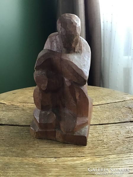 Old carved wooden statue