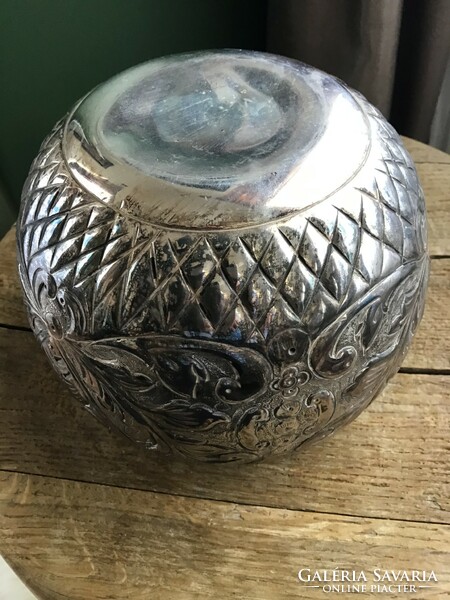 Old silver colored metal vase
