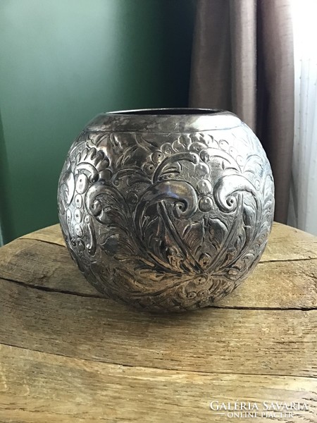 Old silver colored metal vase