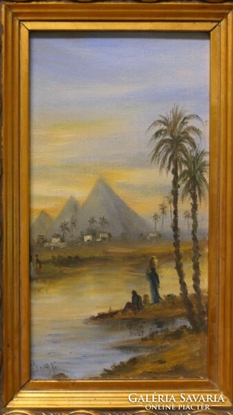 A painting depicting an Egyptian landscape in a beautiful frame