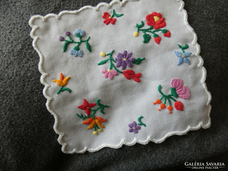 Three small tablecloths with a Kalocsa pattern